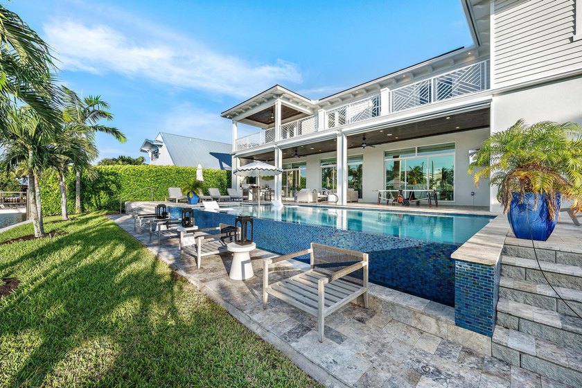 A statement of modern waterfront luxury, this extraordinary - photo 21