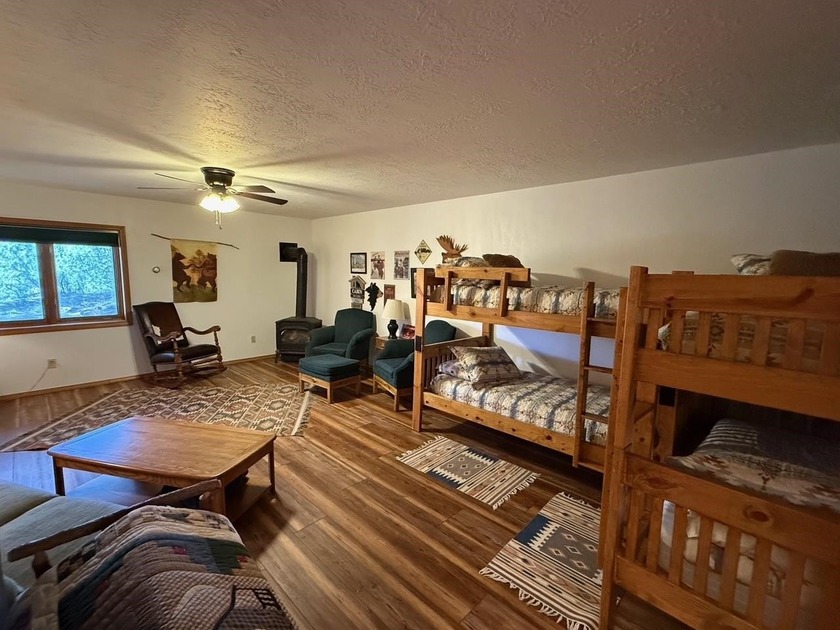 RUSTIC CHARM, SPACIOUS LIVING AREAS, MODERN UPGRADES, FIRE PIT - photo 24