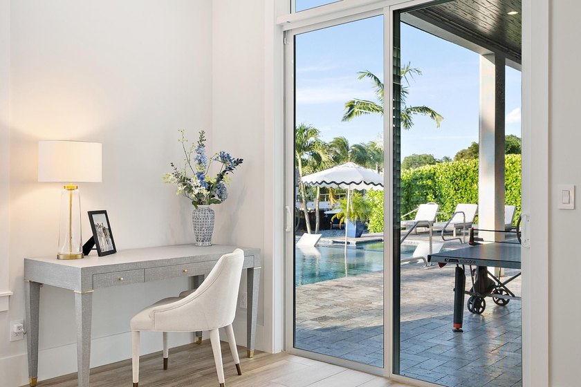 A statement of modern waterfront luxury, this extraordinary - photo 31