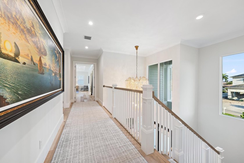 A statement of modern waterfront luxury, this extraordinary - photo 34