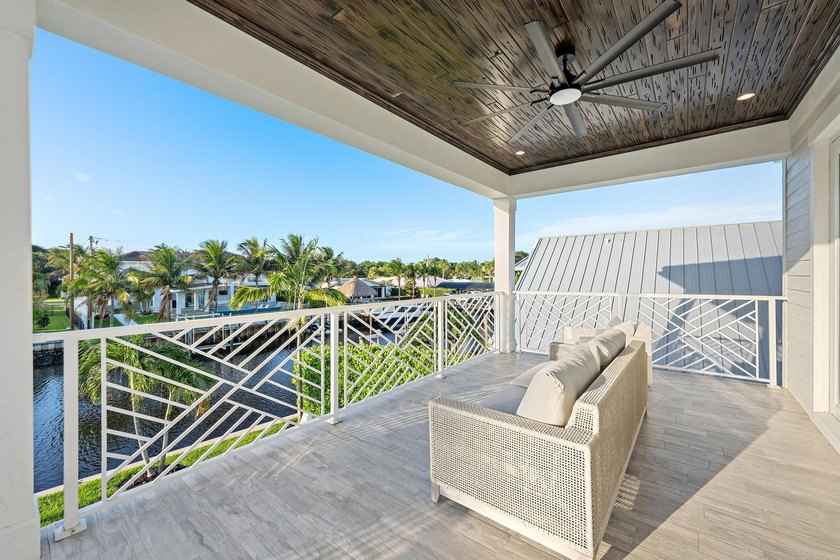 A statement of modern waterfront luxury, this extraordinary - photo 50