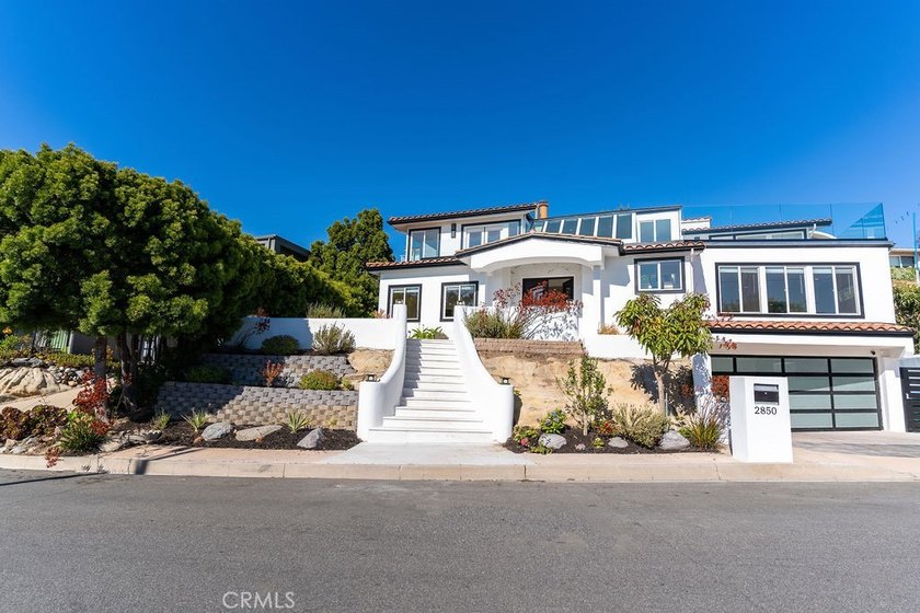 This newly renovated home with breathtaking 180-degree ocean - photo 3