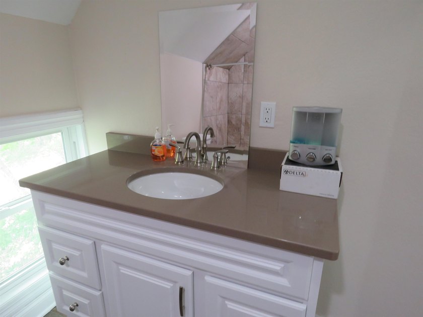 Beautifully remodeled 1 1/2 story home situated on 50 feet of - photo 16