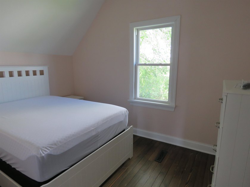 Beautifully remodeled 1 1/2 story home situated on 50 feet of - photo 17