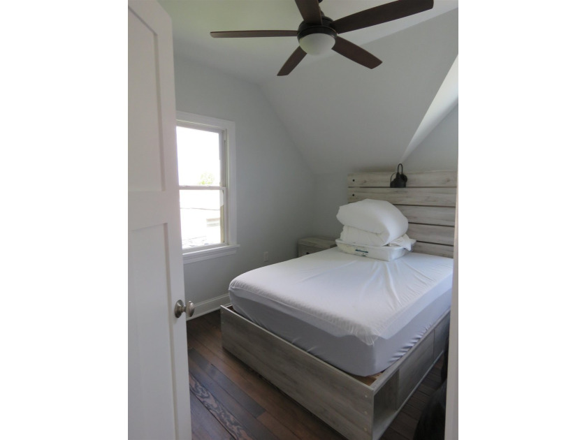 Beautifully remodeled 1 1/2 story home situated on 50 feet of - photo 18