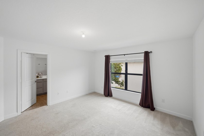 Rare corner-lot townhome with a 2-car garage in a quiet, gated - photo 20