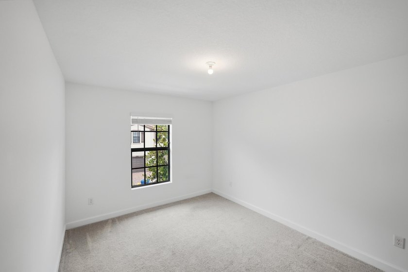 Rare corner-lot townhome with a 2-car garage in a quiet, gated - photo 28