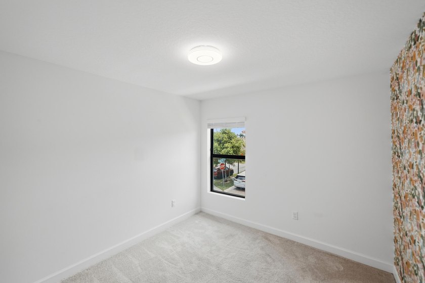 Rare corner-lot townhome with a 2-car garage in a quiet, gated - photo 35