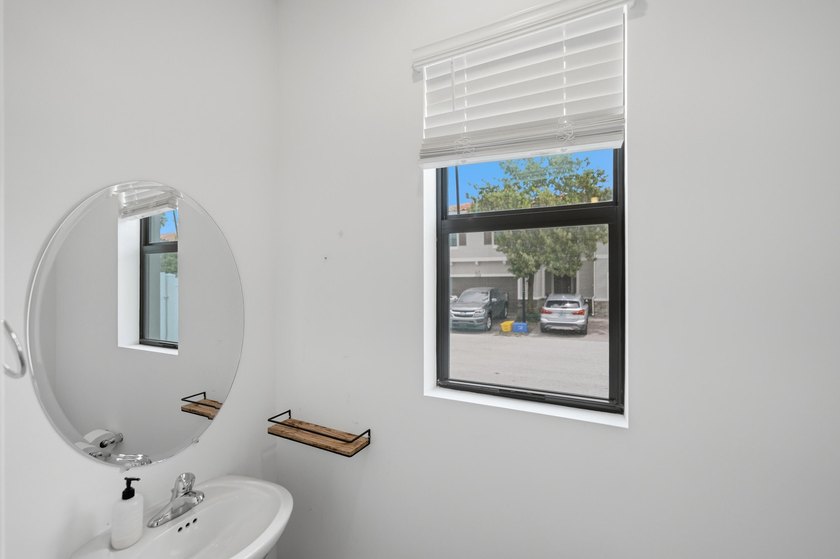 Rare corner-lot townhome with a 2-car garage in a quiet, gated - photo 37