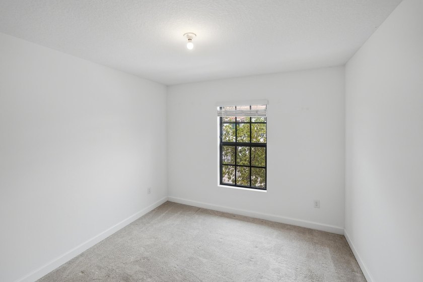 Rare corner-lot townhome with a 2-car garage in a quiet, gated - photo 43
