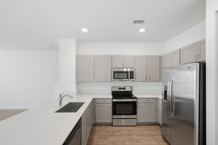 Rare corner-lot townhome with a 2-car garage in a quiet, gated - photo 47