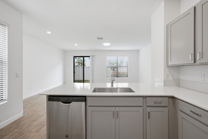 Rare corner-lot townhome with a 2-car garage in a quiet, gated - photo 49