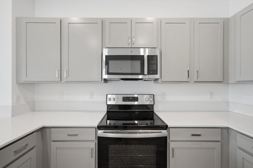 Rare corner-lot townhome with a 2-car garage in a quiet, gated - photo 50