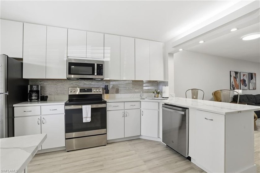 Beautiful first-floor unit with stair-free access, situated on - photo 11