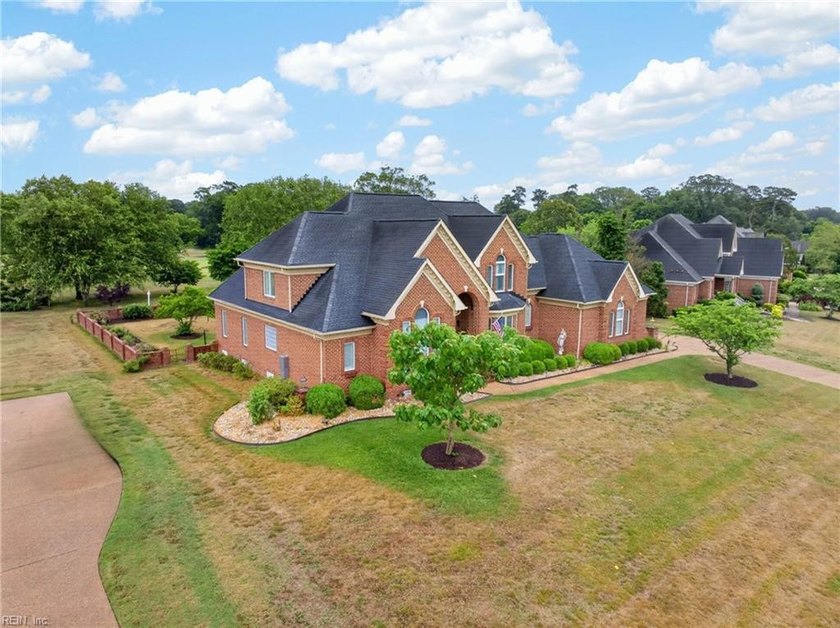 This full brick, custom home has been extensively updated and is - photo 3