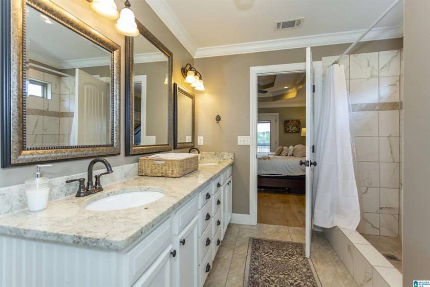 Experience lake living at its finest on year-round water on the - photo 21
