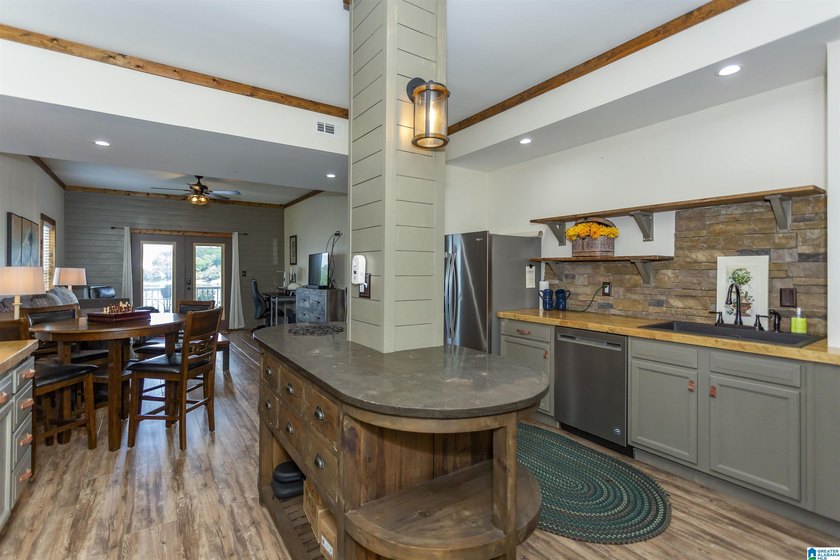 Experience lake living at its finest on year-round water on the - photo 33