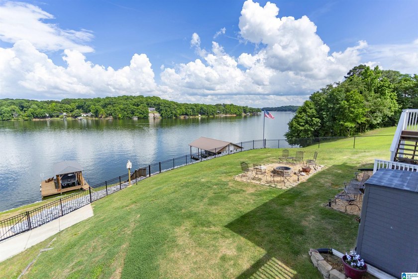 Experience lake living at its finest on year-round water on the - photo 48