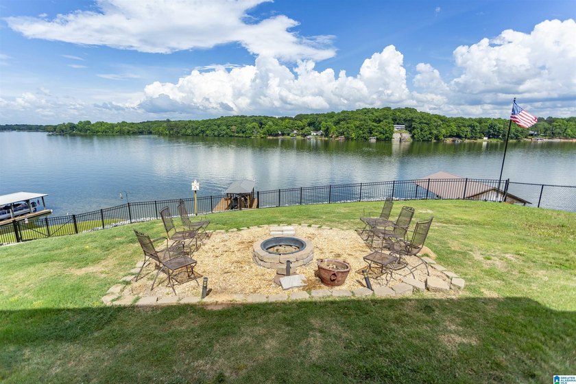 Experience lake living at its finest on year-round water on the - photo 49