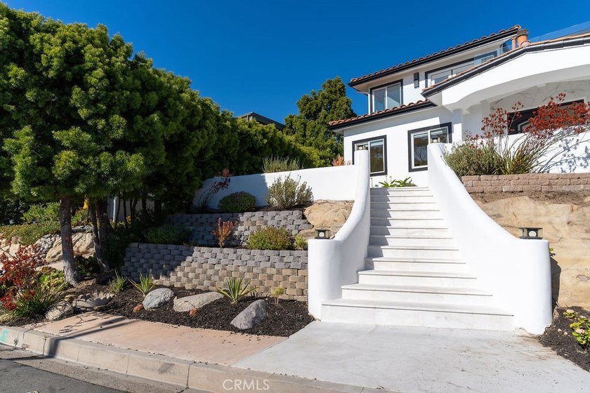 This newly renovated home with breathtaking 180-degree ocean - photo 5