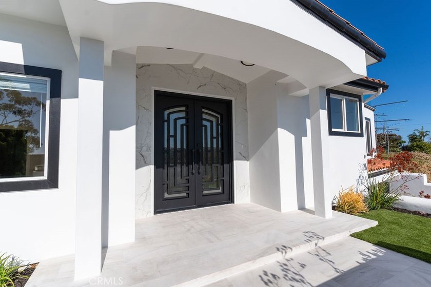 This newly renovated home with breathtaking 180-degree ocean - photo 7