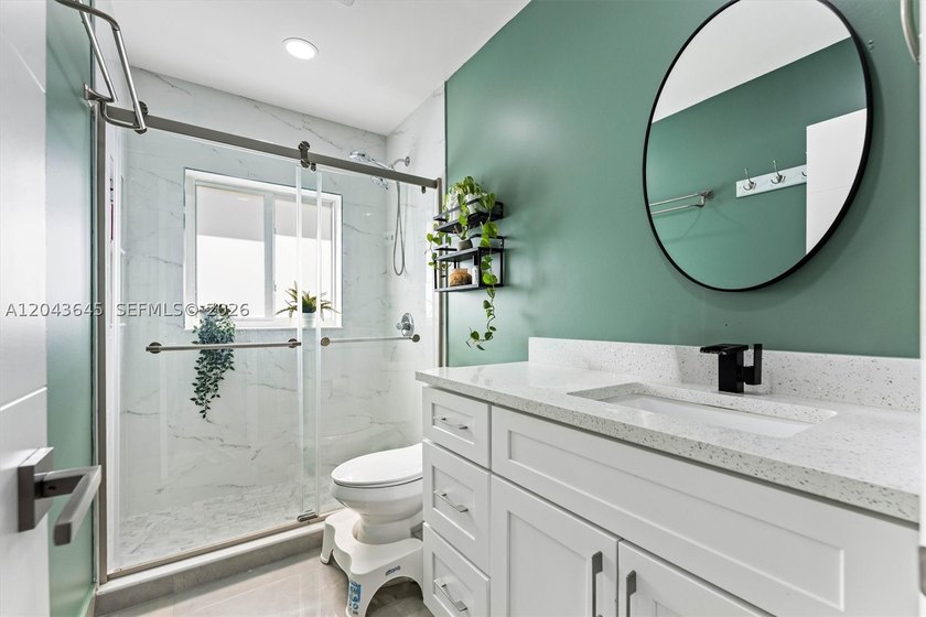 Welcome to this beautifully renovated 3-bedroom, 3-bathroom home - photo 22