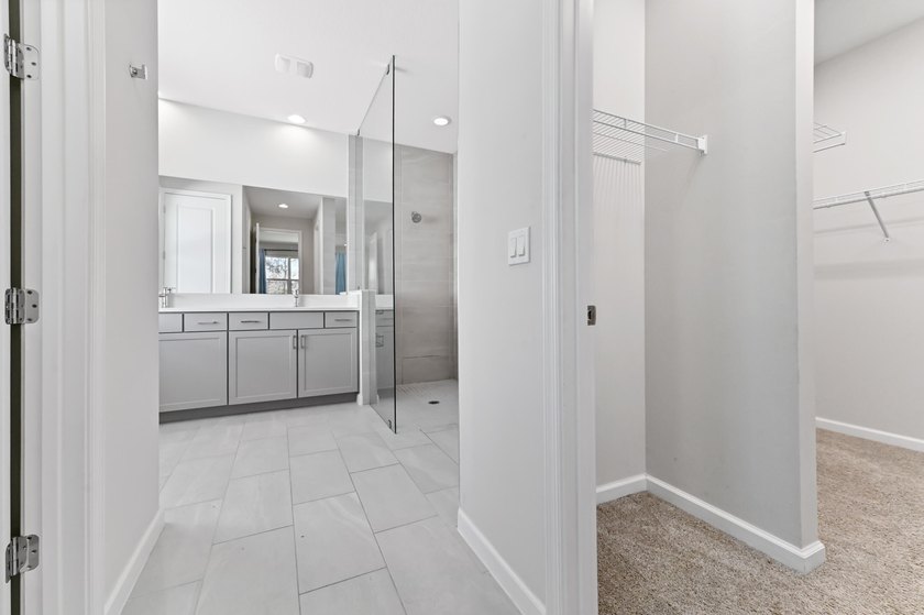 Enter through a statement-making modern frosted-glass front door - photo 12