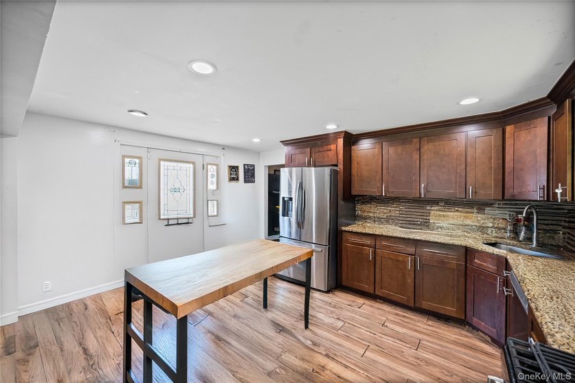 Welcome to this beautifully designed 4-bedroom, 3-bath expanded - photo 10