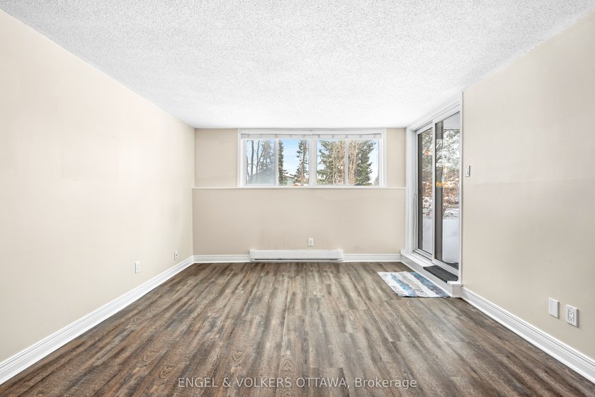 Welcome to this beautifully renovated 2-bedroom main floor condo - photo 9