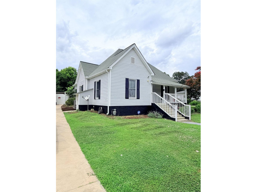 Welcome to 4 Front Street! Step inside this inviting 2-bedroom - photo 2