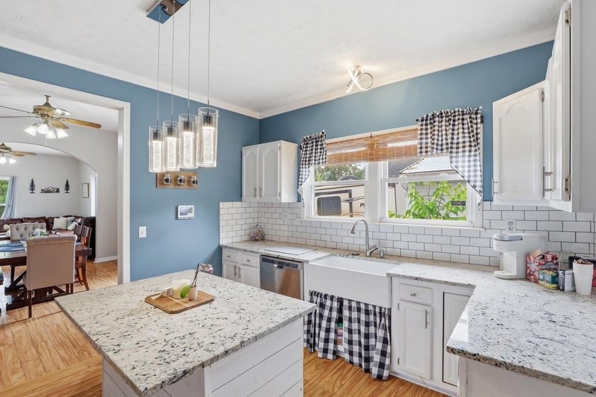 Welcome to 4 Front Street! Step inside this inviting 2-bedroom - photo 4