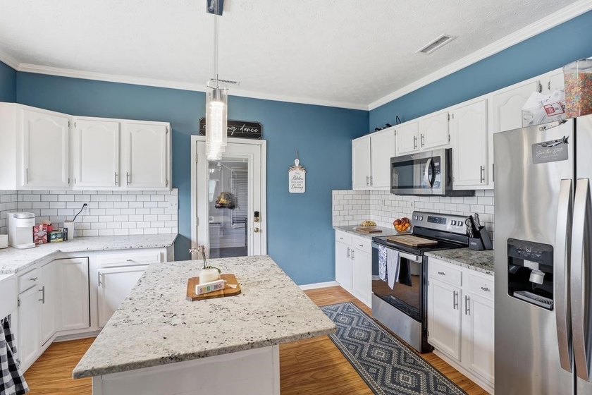 Welcome to 4 Front Street! Step inside this inviting 2-bedroom - photo 5