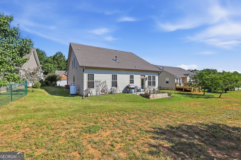 Welcome to this spacious 4 bedroom, 3 bath home in the highly - photo 43
