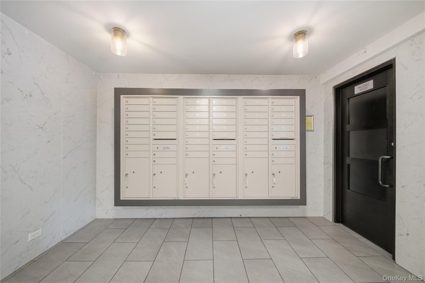 Welcome to this move-in-ready garden-level studio co-op at - photo 17