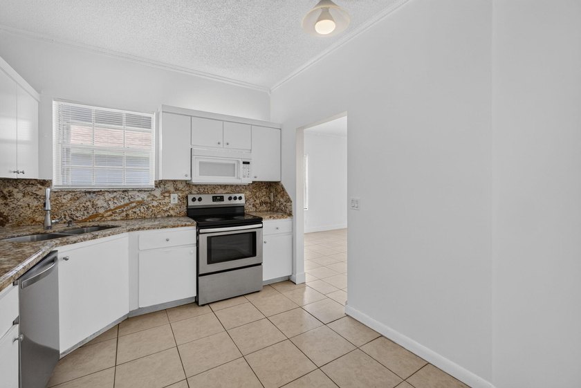 What a value! Solid CBS construction, 3 bedrooms, 2 baths plus 1 - photo 18