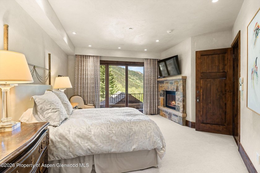 Nestled among a serene grove of mature aspens in one of Aspen's - photo 22