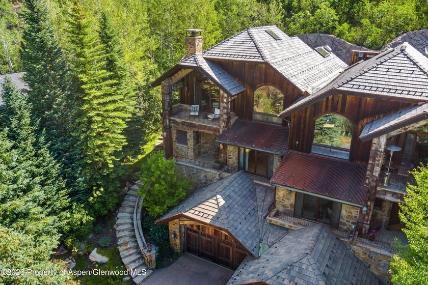 Nestled among a serene grove of mature aspens in one of Aspen's - photo 41