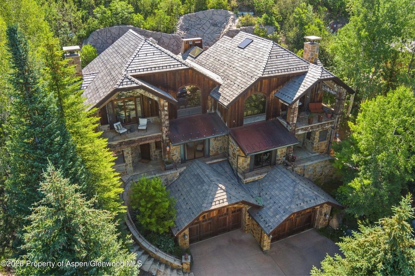 Nestled among a serene grove of mature aspens in one of Aspen's - photo 42