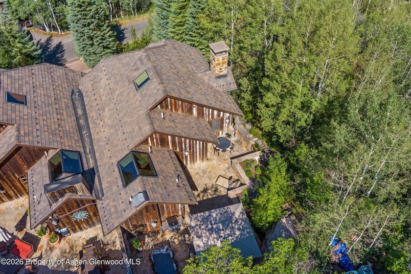 Nestled among a serene grove of mature aspens in one of Aspen's - photo 43