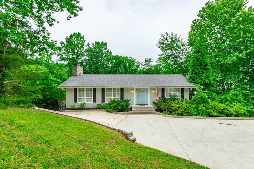 Welcome to 1043 Clift Cave Drive, where breathtaking waterfront - photo 8