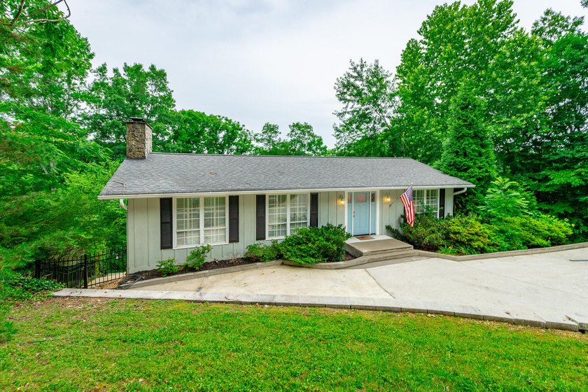 Welcome to 1043 Clift Cave Drive, where breathtaking waterfront - photo 10
