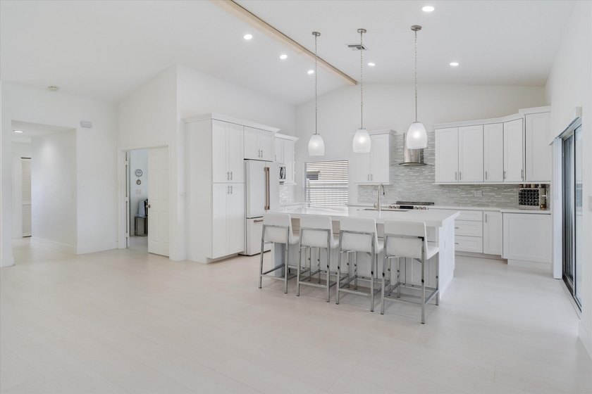 Stunning updated spacious 4 bed/2 bath pool home in gated - photo 11