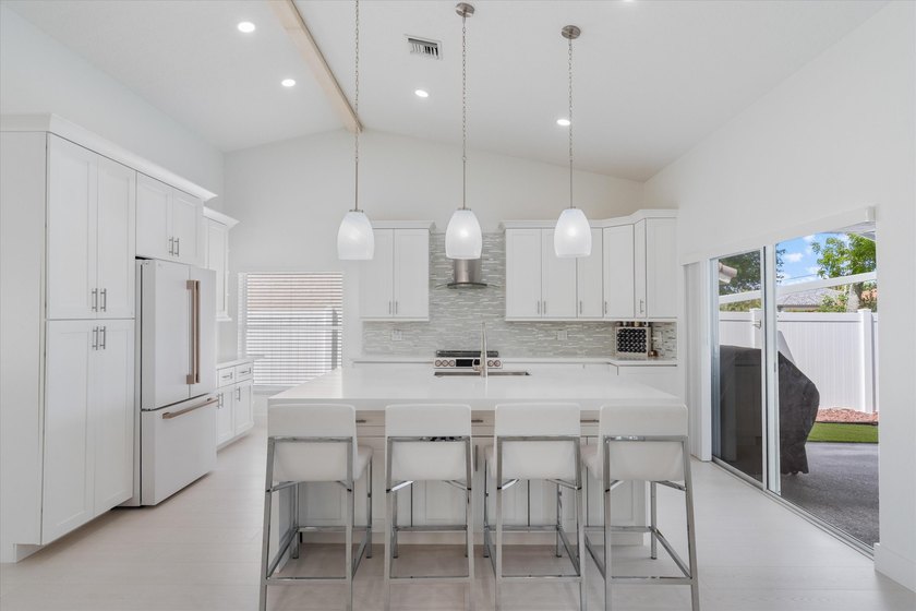 Stunning updated spacious 4 bed/2 bath pool home in gated - photo 13