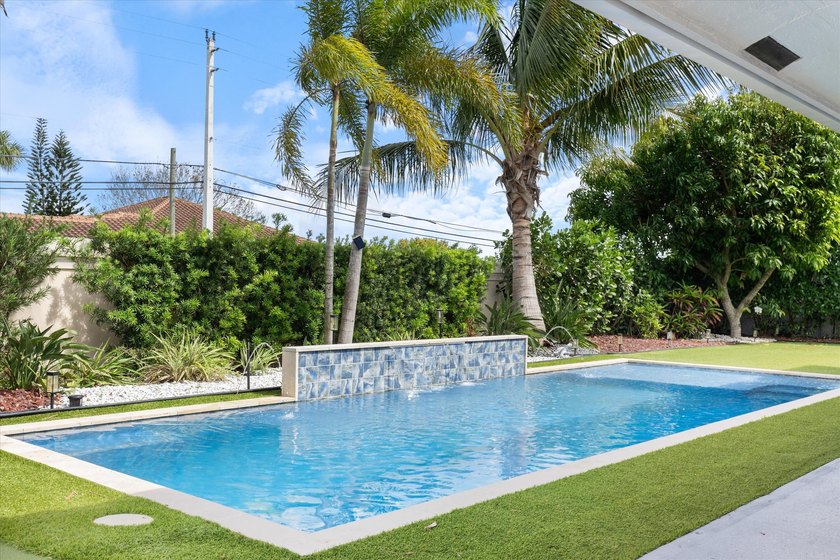 Stunning updated spacious 4 bed/2 bath pool home in gated - photo 40