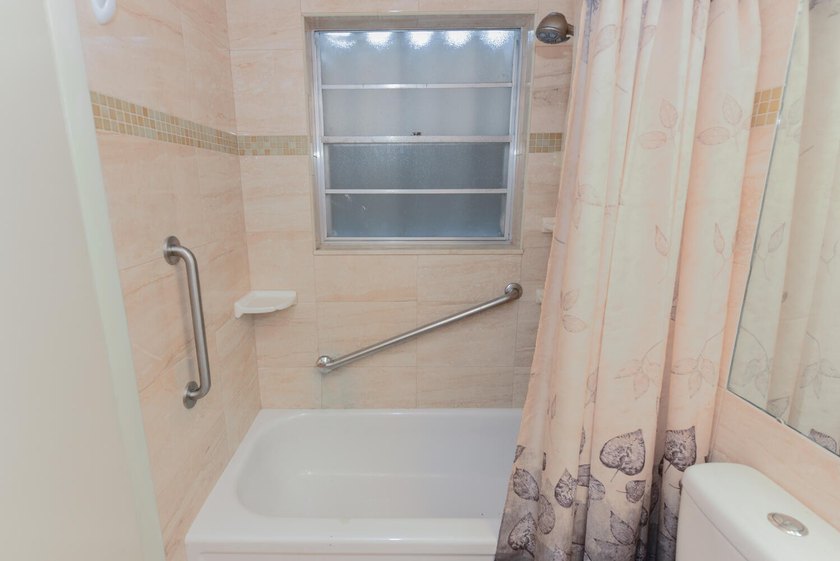 Step into this beautifully bright and spacious first-floor - photo 8
