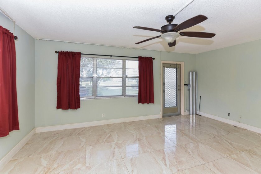 Step into this beautifully bright and spacious first-floor - photo 10