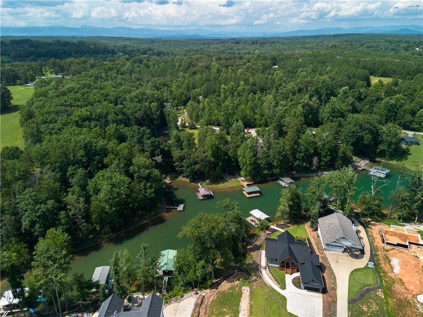 Experience Luxury Lake Living on Lake Keowee This unique - photo 34