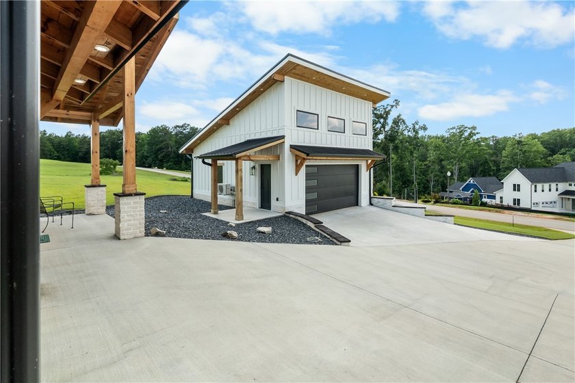 Experience Luxury Lake Living on Lake Keowee This unique - photo 36