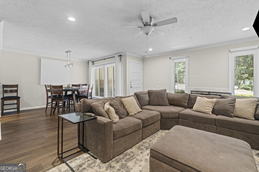 Welcome to this inviting end-unit townhome nestled in the highly - photo 11