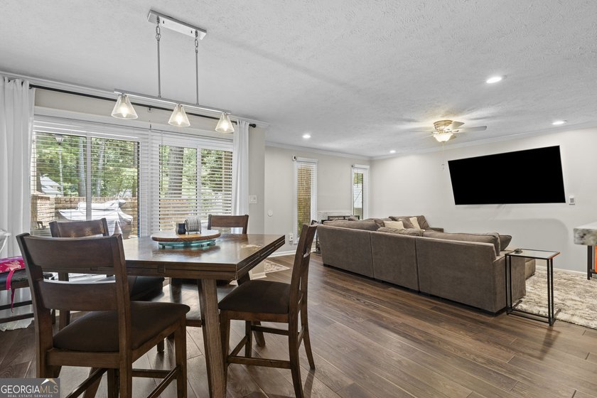 Welcome to this inviting end-unit townhome nestled in the highly - photo 19